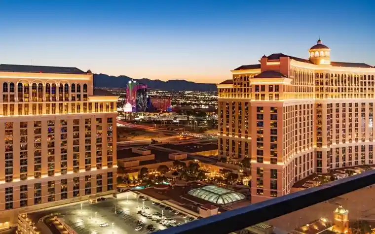 Aerial dusk view of Las Vegas Strip hotel towers along the boulevard